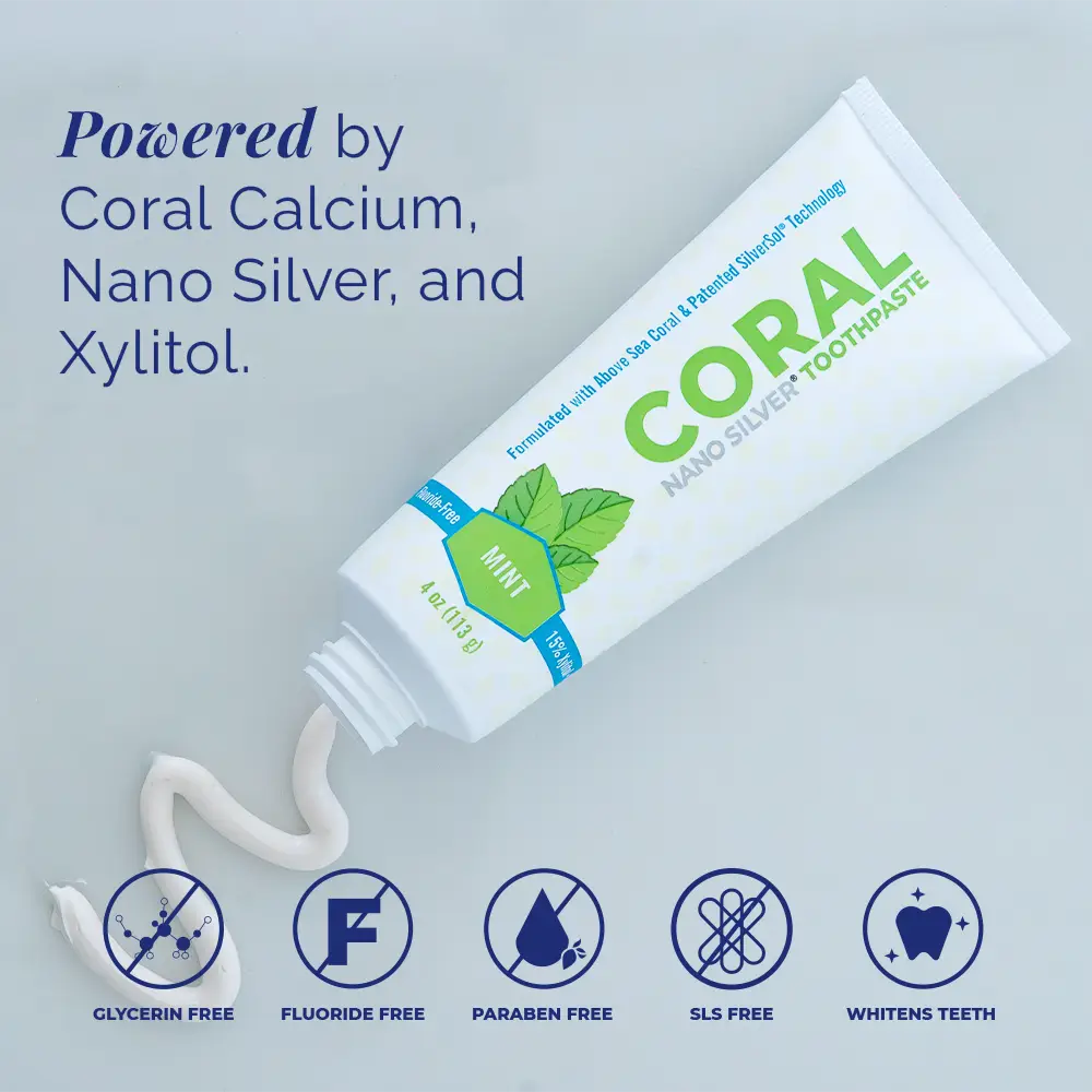Tube of Coral Nano Silver Toothpaste with product features listed on a gray background