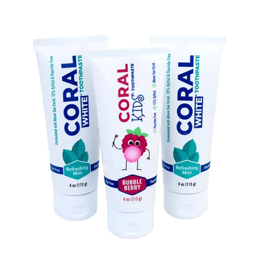 Three tubes of Coral White toothpaste on a white background