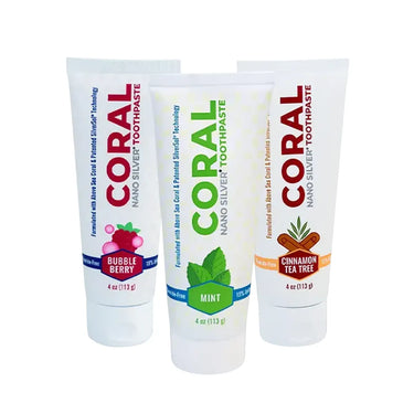 Three tubes of Coral Nano Silver Toothpaste with different flavors on a white background