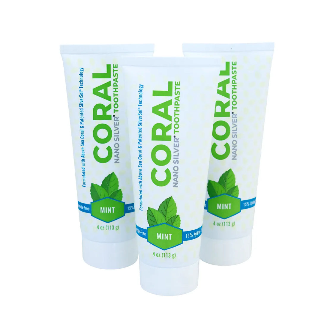 Three tubes of Coral Nano Silver Toothpaste with mint flavor on a white background