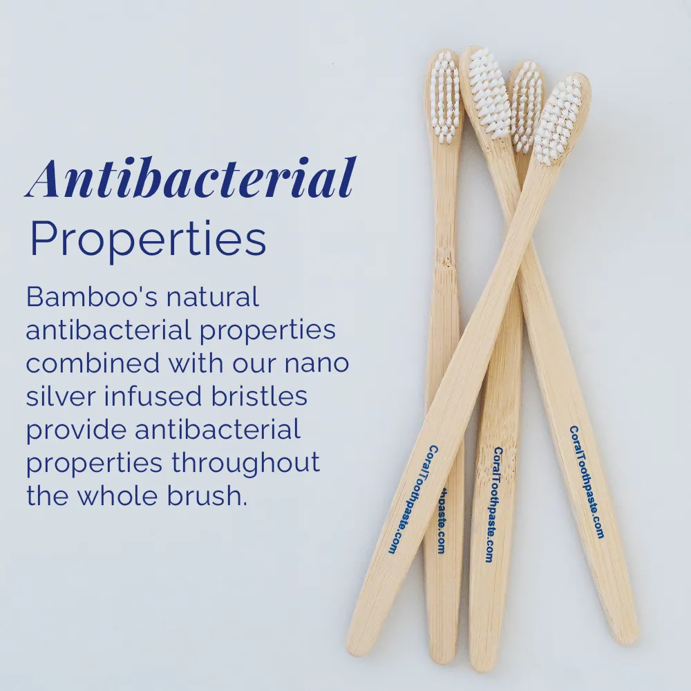 All-natural bamboo toothbrushes for adults with nano silver–infused bristles, highlighting antibacterial properties of bamboo and silver, arranged on a white background