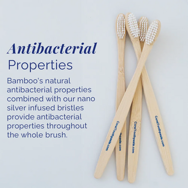 All-natural bamboo toothbrushes for adults with nano silver–infused bristles, highlighting antibacterial properties of bamboo and silver, arranged on a white background