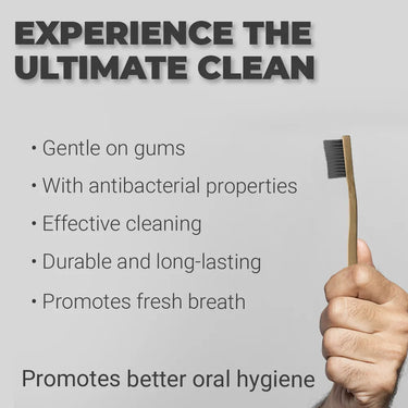 Infographic featuring a hand holding a Coral Bamboo Charcoal Toothbrush with black bristles. Highlights include antibacterial properties, gentle on gums, effective deep cleaning, long-lasting durability, and promotion of fresh breath for better oral hygiene.