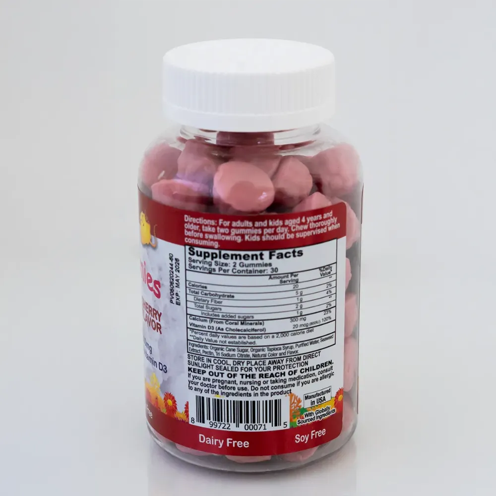 Supplement bottle with pink gummies and visible label on a white background