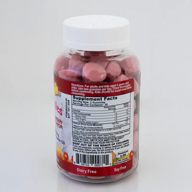 Supplement bottle with pink gummies and visible label on a white background