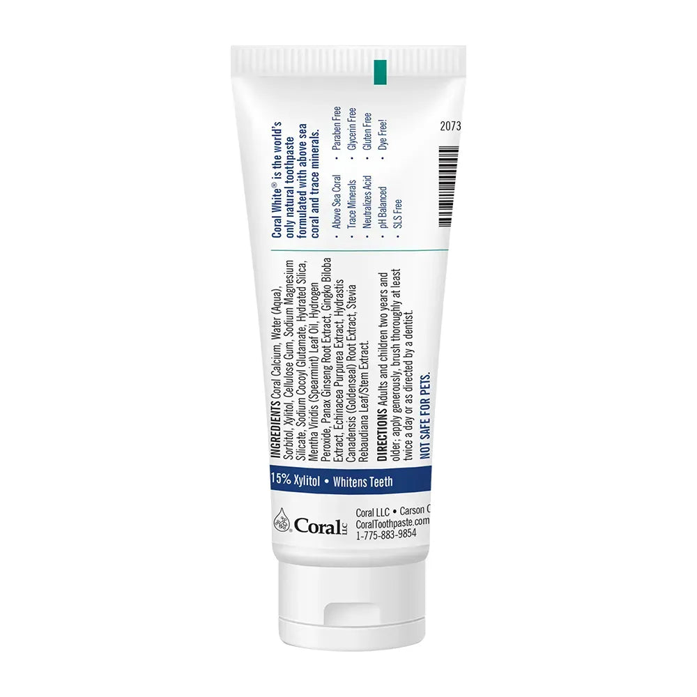 Back of Coral White Fluoride-Free Toothpaste showing natural ingredients, 15% xylitol content, directions, and benefits like whitening and SLS-free formulation.