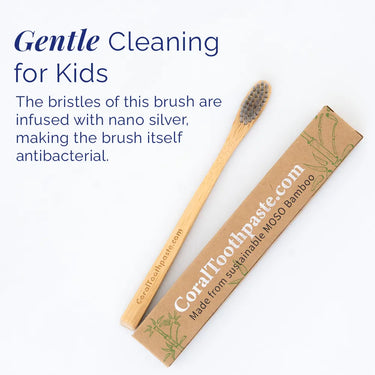 Coral Kids Bamboo Toothbrush with nano silver–infused bristles for gentle, antibacterial cleaning, shown with sustainable MOSO bamboo packaging on a white background, designed for safe and effective daily oral care for children.