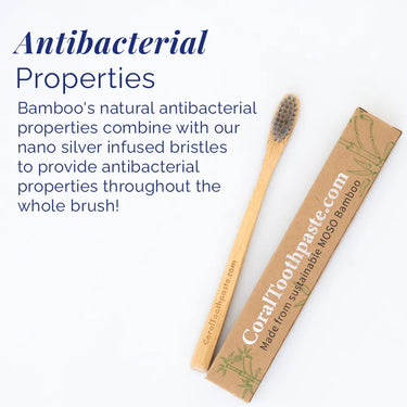 Coral Bamboo Toothbrush with nano silver–infused bristles and natural antibacterial properties, shown alongside sustainable MOSO bamboo packaging on a white background, designed to help reduce bacteria and support cleaner, healthier oral care.