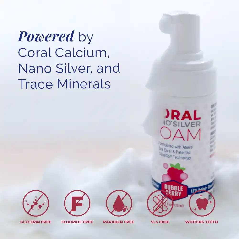 Coral Nano Silver Foaming Toothpaste Bubble Berry flavor with foam background — powered by coral calcium, nano silver, and trace minerals. Icons highlight key benefits: glycerin-free, fluoride-free, paraben-free, SLS-free, and whitens teeth. Natural fluoride-free oral care formula with SilverSol technology.
