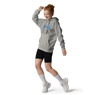 Person wearing a gray hoodie with text, black shorts, white socks, and white sneakers on a white background