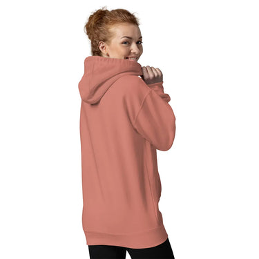 Person wearing a pink hoodie on a white background