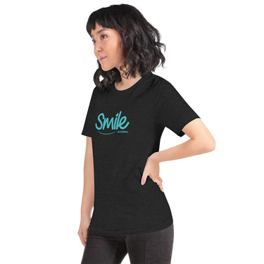 Person wearing a black t-shirt with 'smile' text on a white background
