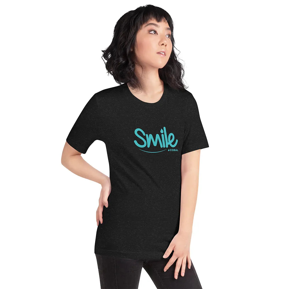 Person wearing a black t-shirt with 'Smile' text on a white background