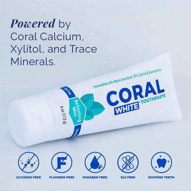 Tube of Coral White toothpaste with product features listed on a light blue background